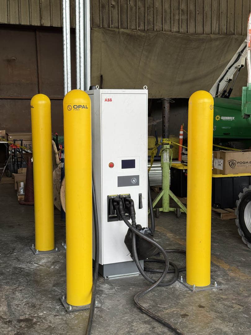 Commercial EV charger pedestal with protective bollards